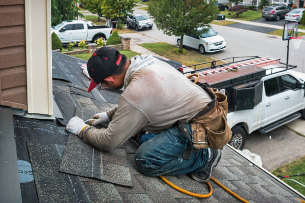 Professional Roofing technician working in Centralia, KS